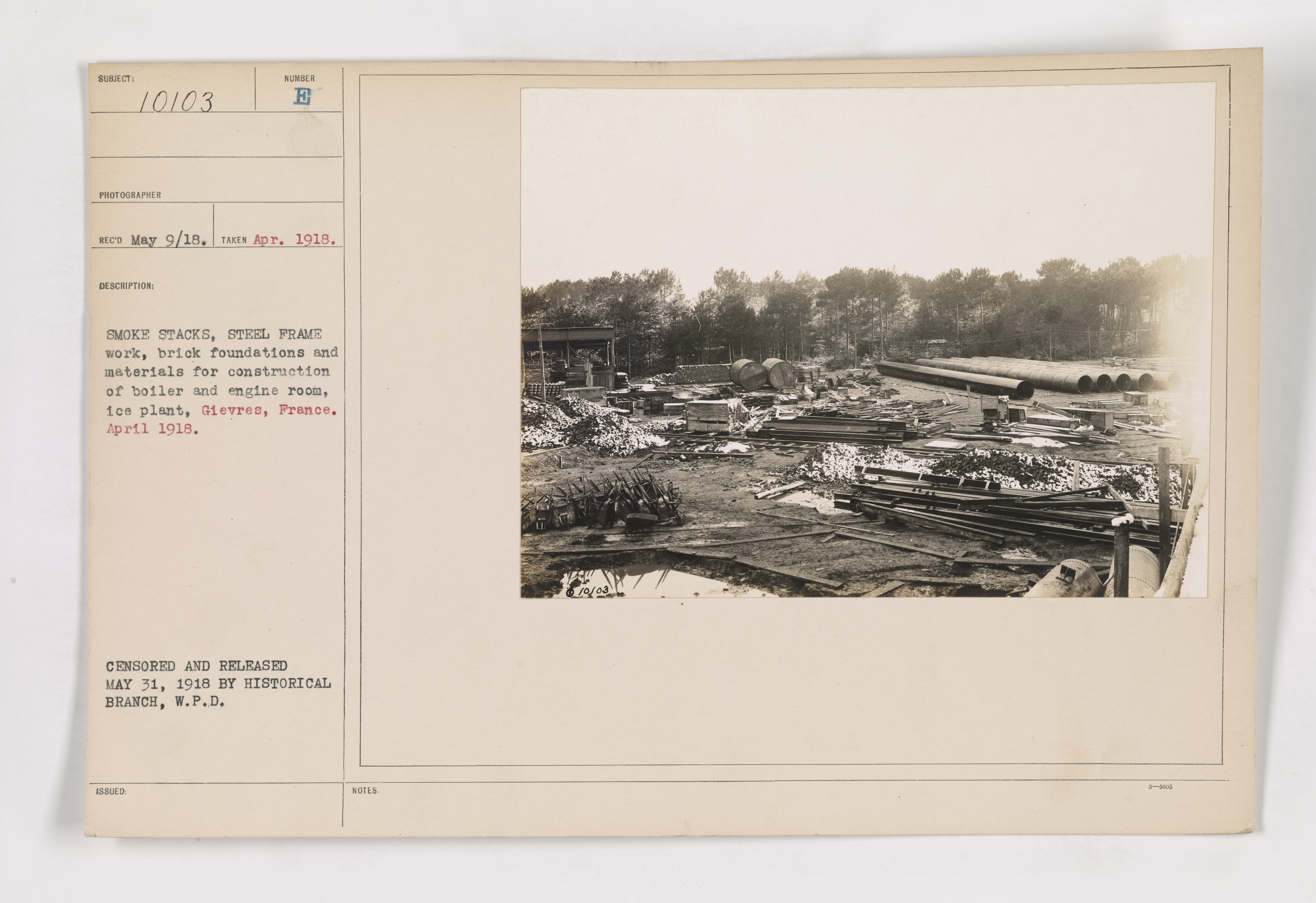 111-SC-10103 - Smoke stacks, steel frame work, brick foundations and materials for construction of boiler and engine room, ice plant. Gievres, France. April 1918