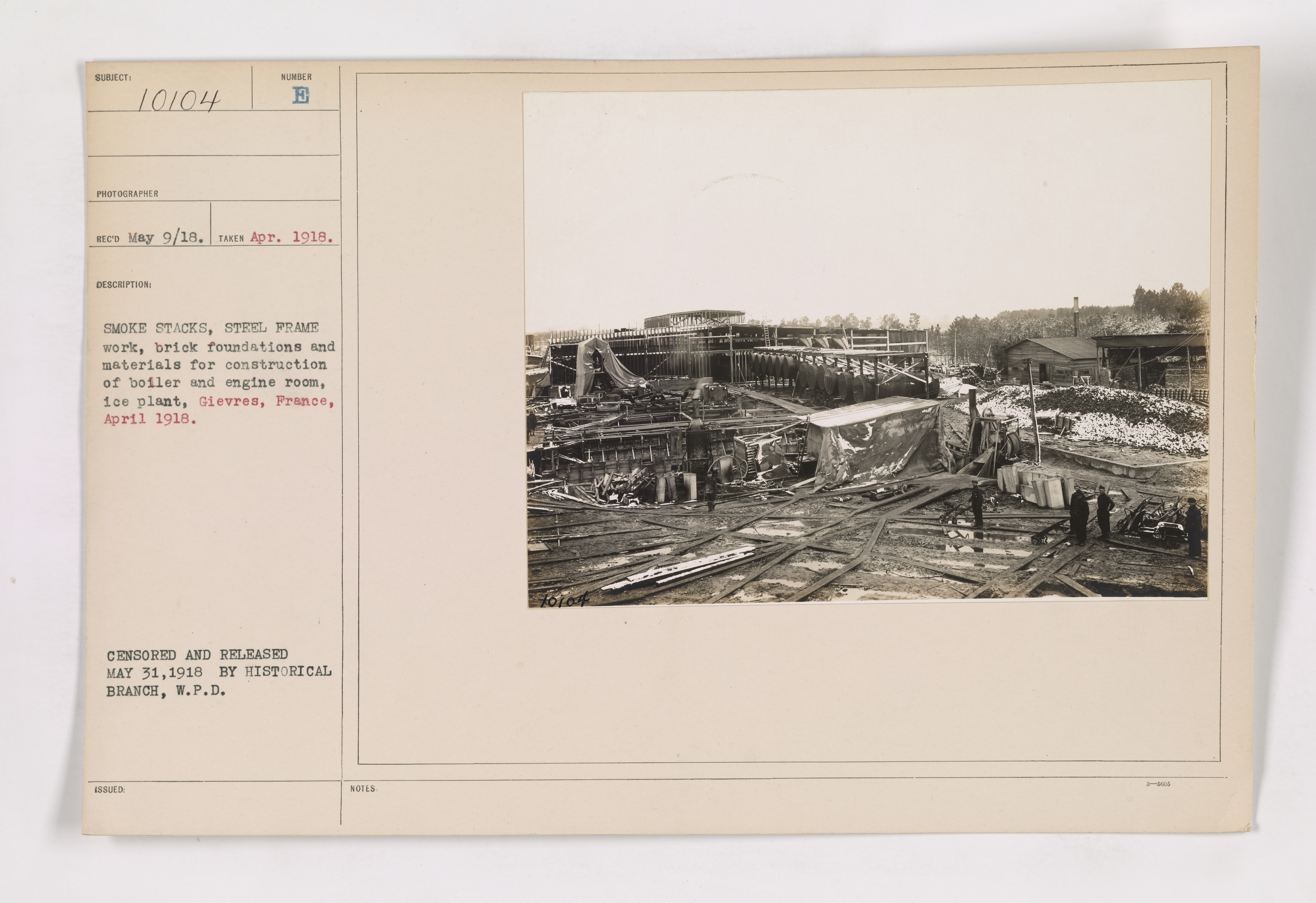 111-SC-10104 - Smoke stacks, steel frame work, brick foundations and materials for construction of boiler and engine room, ice plant. Gievres, France. April 1918