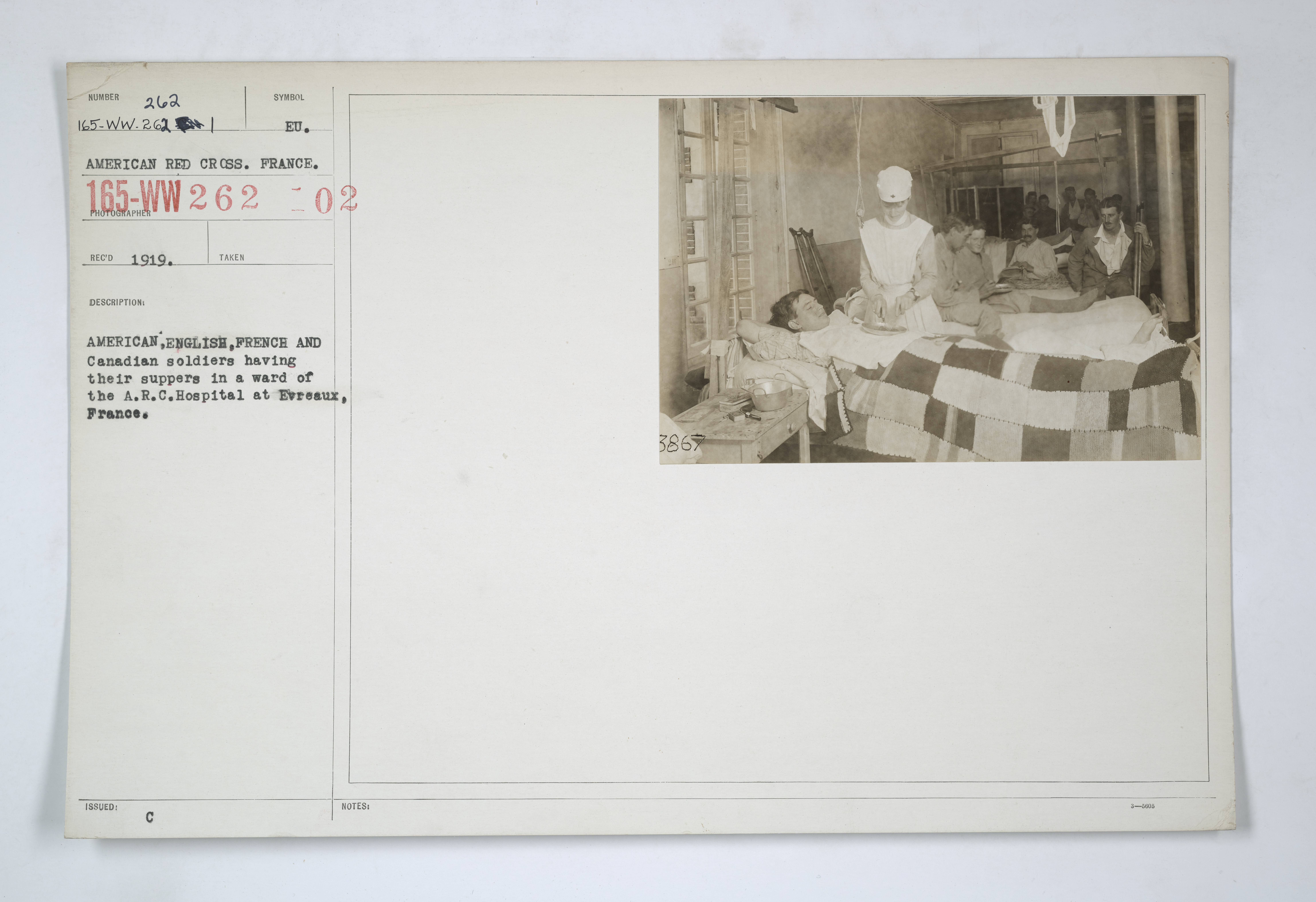 Medical Department - Hospitals - In Theater of Operations - Miscellaneous - American, English, French and Canadian soldiers having their suppers in ward of the American Red Cross Hospital at Evreaux, France