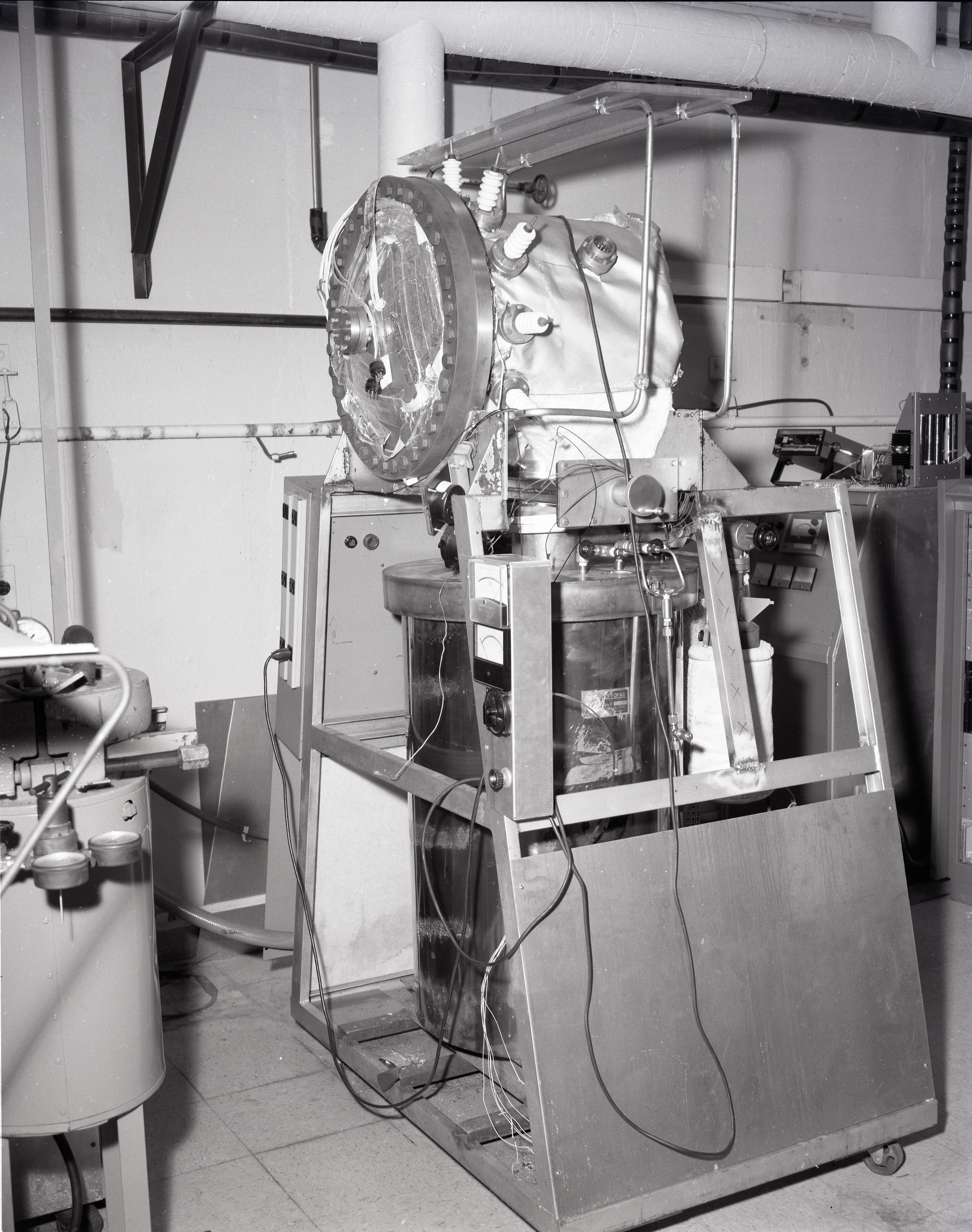 TEST RIGS - PARYLENE RIG - X FORMER LIFE TEST - LAMINATE LIFE TEST - PRESSURE POTS - TALL BELL JAR AND LOW - COMMUNICATION TECHNOLOGY SATELLITE CTS OUT GASSING