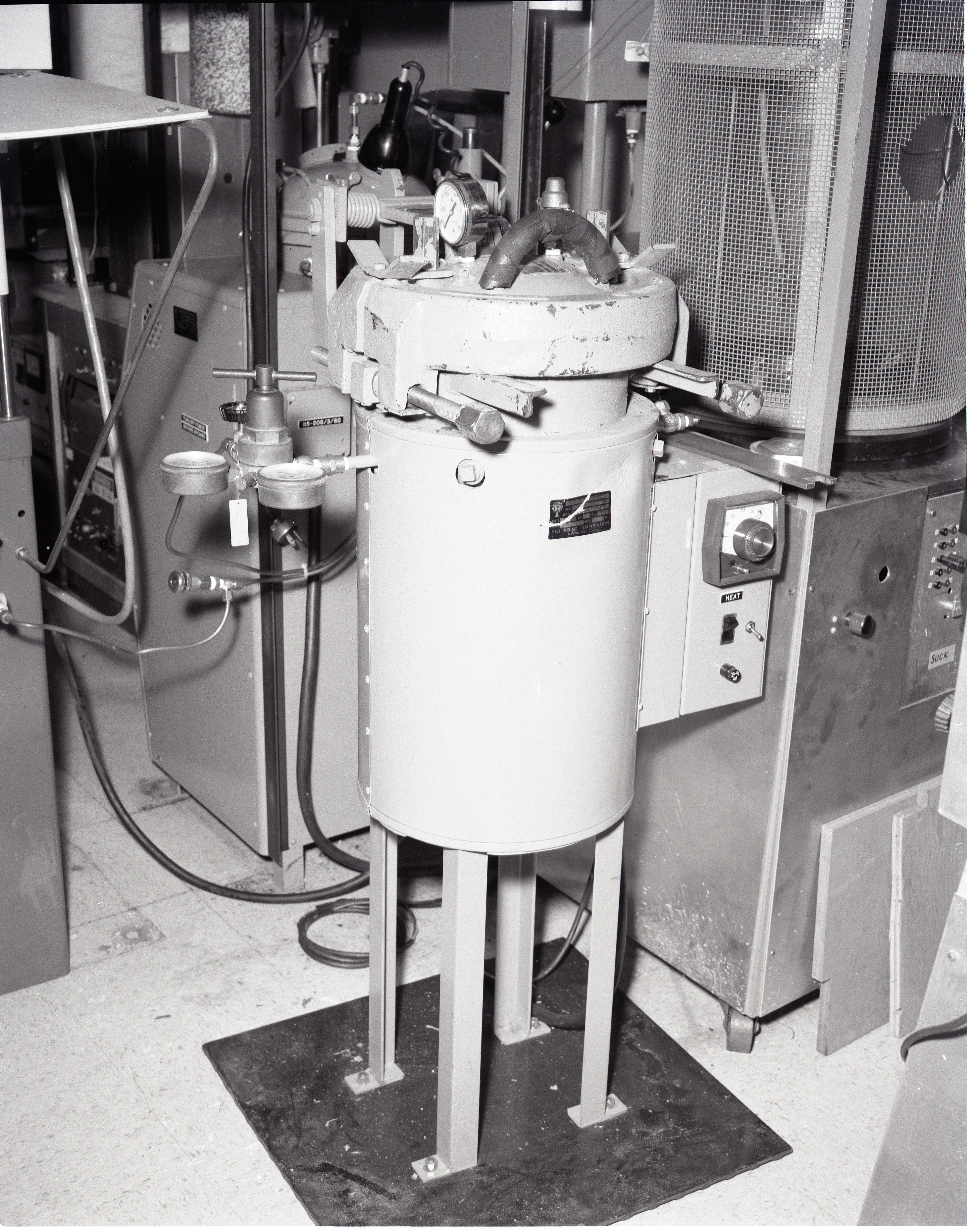 TEST RIGS - PARYLENE RIG - X FORMER LIFE TEST - LAMINATE LIFE TEST - PRESSURE POTS - TALL BELL JAR AND LOW - COMMUNICATION TECHNOLOGY SATELLITE CTS OUT GASSING