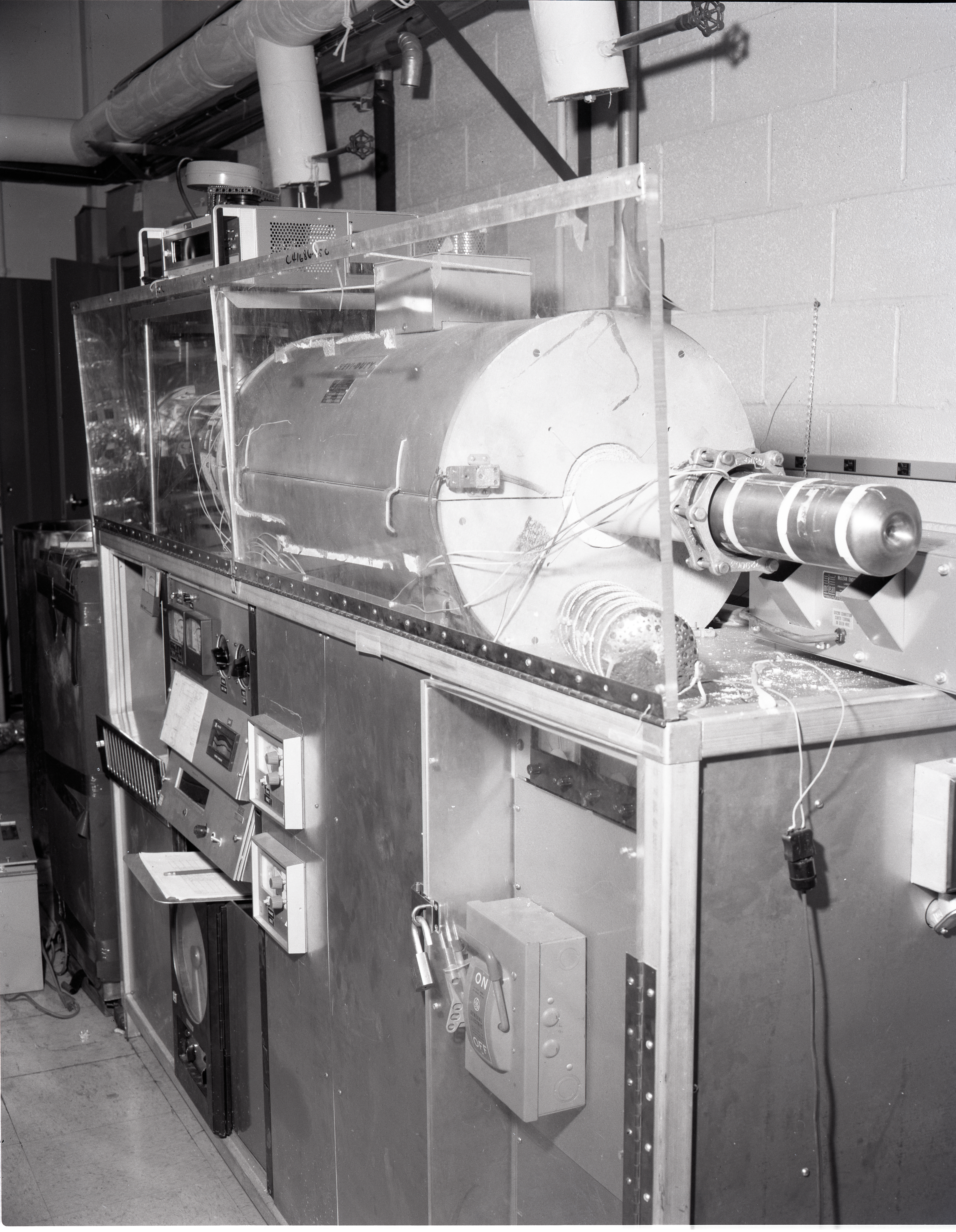 TEST RIGS - PARYLENE RIG - X FORMER LIFE TEST - LAMINATE LIFE TEST - PRESSURE POTS - TALL BELL JAR AND LOW - COMMUNICATION TECHNOLOGY SATELLITE CTS OUT GASSING