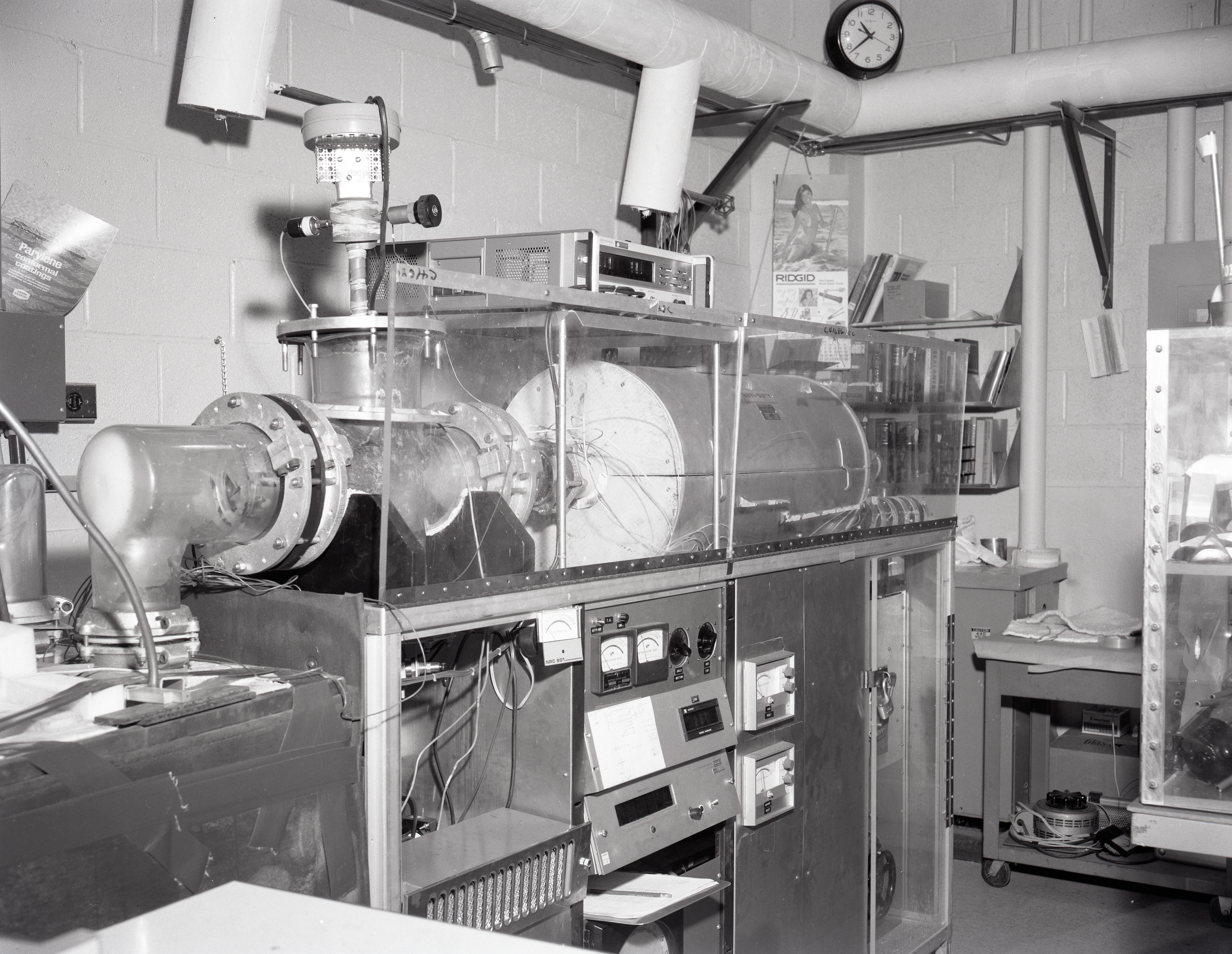 TEST RIGS - PARYLENE RIG - X FORMER LIFE TEST - LAMINATE LIFE TEST - PRESSURE POTS - TALL BELL JAR AND LOW - COMMUNICATION TECHNOLOGY SATELLITE CTS OUT GASSING