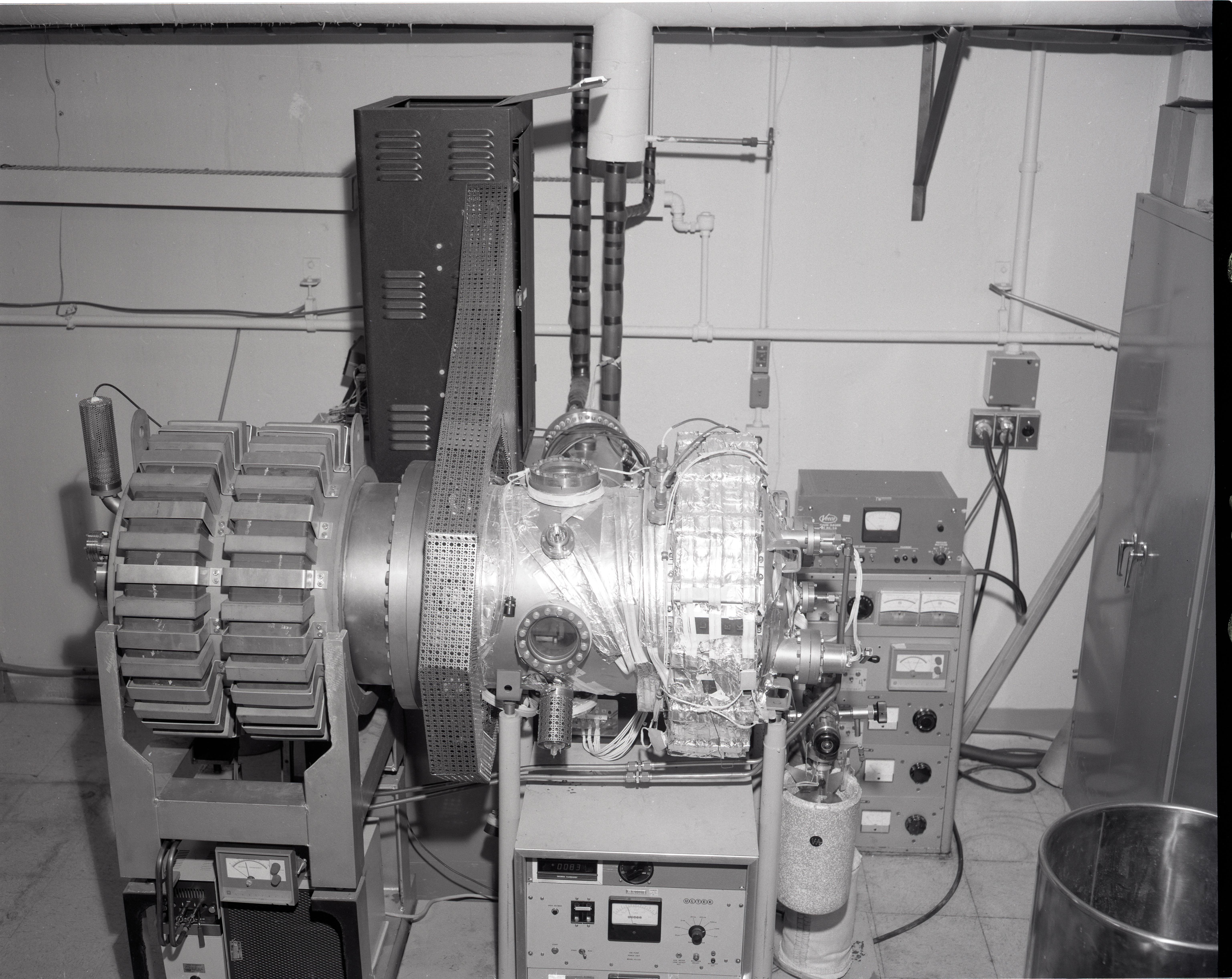 TEST RIGS - PARYLENE RIG - X FORMER LIFE TEST - LAMINATE LIFE TEST - PRESSURE POTS - TALL BELL JAR AND LOW - COMMUNICATION TECHNOLOGY SATELLITE CTS OUT GASSING