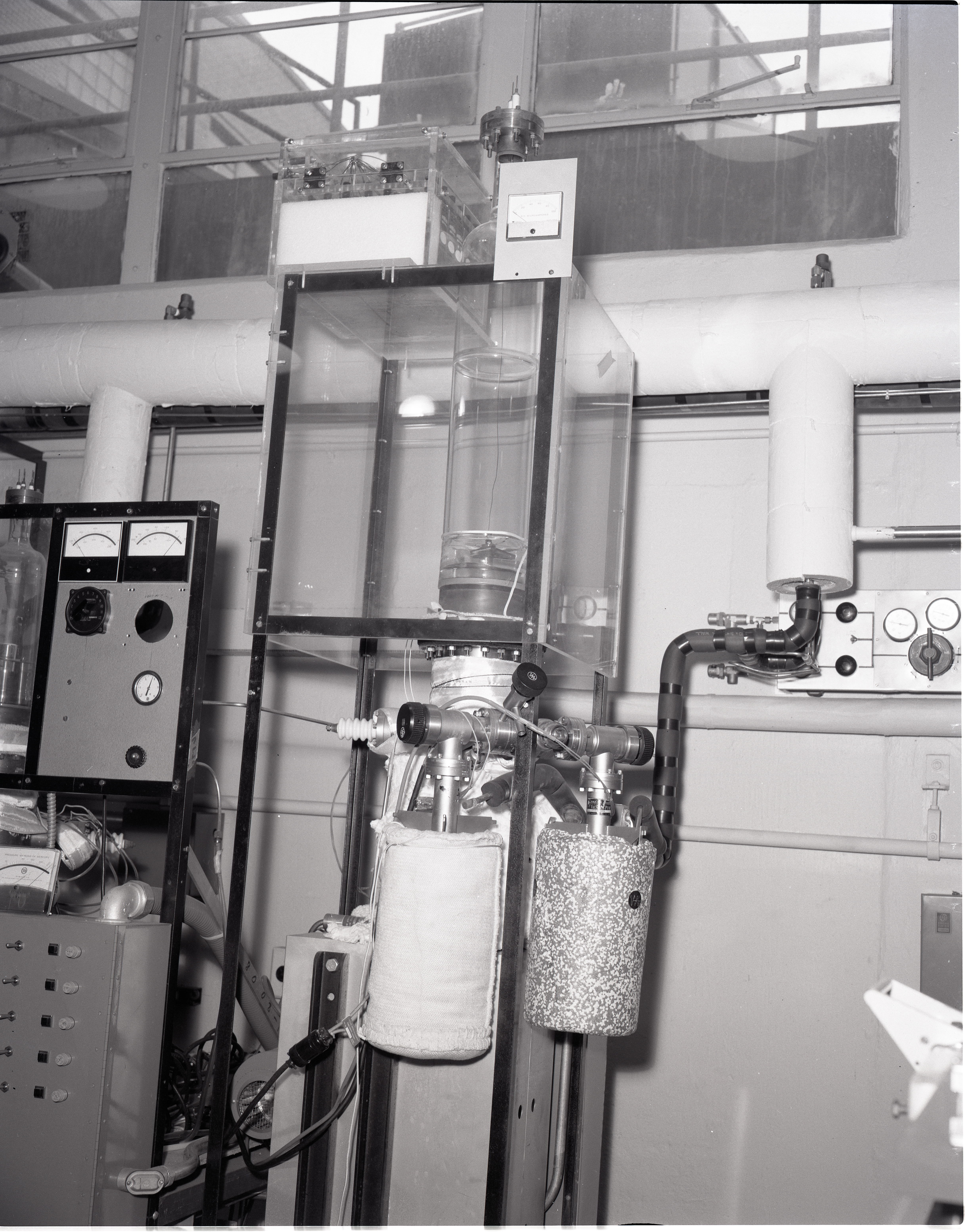 TEST RIGS - PARYLENE RIG - X FORMER LIFE TEST - LAMINATE LIFE TEST - PRESSURE POTS - TALL BELL JAR AND LOW - COMMUNICATION TECHNOLOGY SATELLITE CTS OUT GASSING