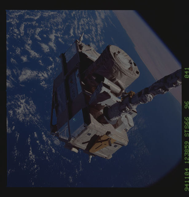 STS066-96-041 - STS-066 - CRISTA-SPAS - Atlantis' RMS deploys the CRISTA-SPAS during STS-66 mission
