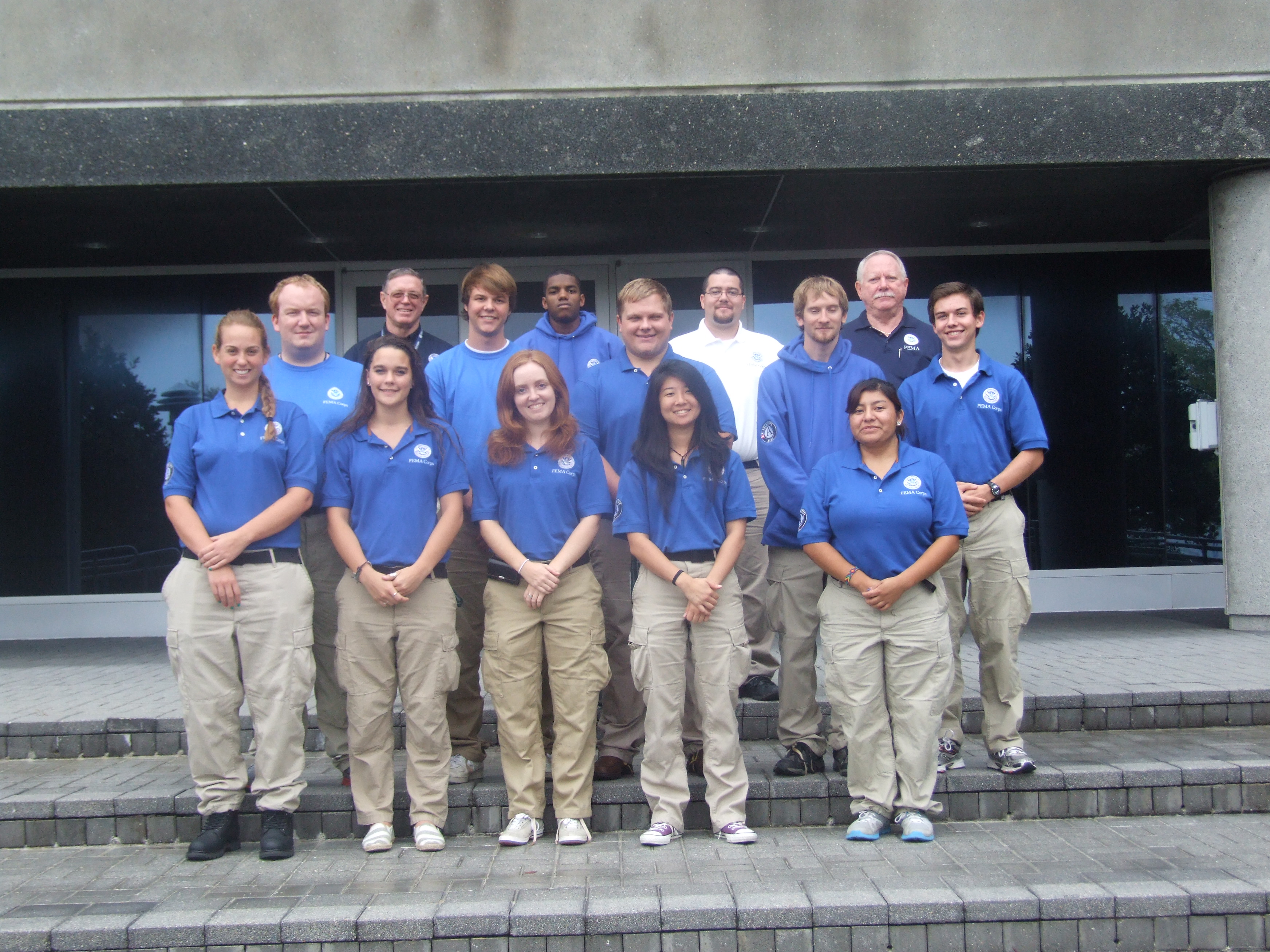 Richmond, Va., Oct. 1, 2012 -- FEMA Corps members pose for a group shot. Row 1 (left to right) - Rachael Fulk, Davis, CA; Kelsie Langston, Jacobus, PA; Jessica Smith, Atlanta, GA; Kimberly Teruya, Los Angeles, CA; Michelle Zarate, Los Angeles, CA. Row 2 (left to right) - Duncan Skjaret, Long Lake, MN; Bradley Tidball, Jacksonville, FL; Zachary Silk, Virginia Beach, VA; Sean Hanrahan, Corvallis, OR; Samuel Poppen, Rapid City, SD. Back Row (left to right) - FCO Donald Keldsen, Joseph Trimble, Montgomery, AL; Dan Faris, Berlin, NJ, PA Infrastructure Branch Director Ray Stout