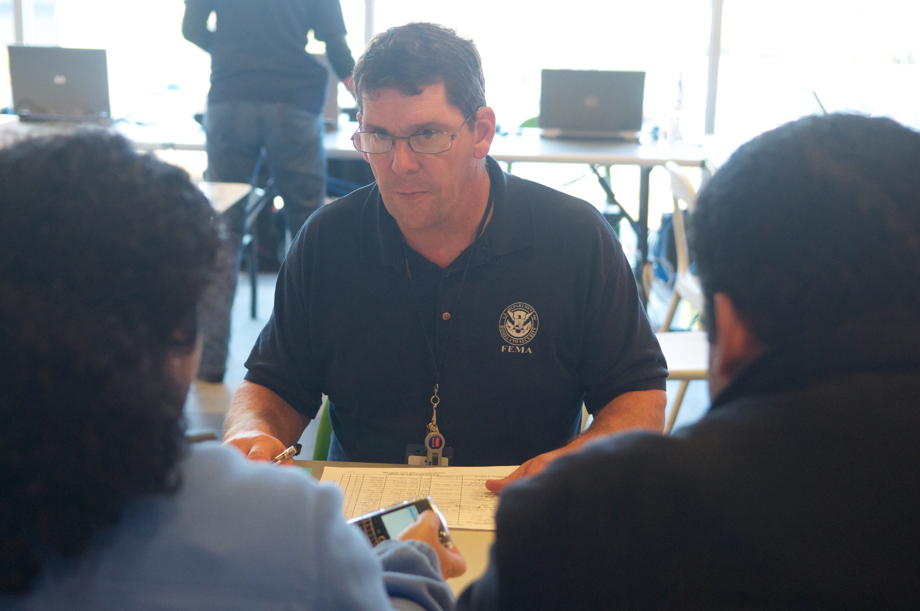 Brooklyn, N.Y., Nov. 11, 2012 -- Disaster survivors get assistance by Community Relations specialists in Disaster Recovery Center (DRC) located in 1 Beard Street, Brooklyn, NY. FEMA is working with many partners including federal, state, local and tribal governments, voluntary, faith-based and community-based organizations, and the private sector to assist residents impacted by Hurricane Sandy. Photo by Eliud Echevarria/FEMA