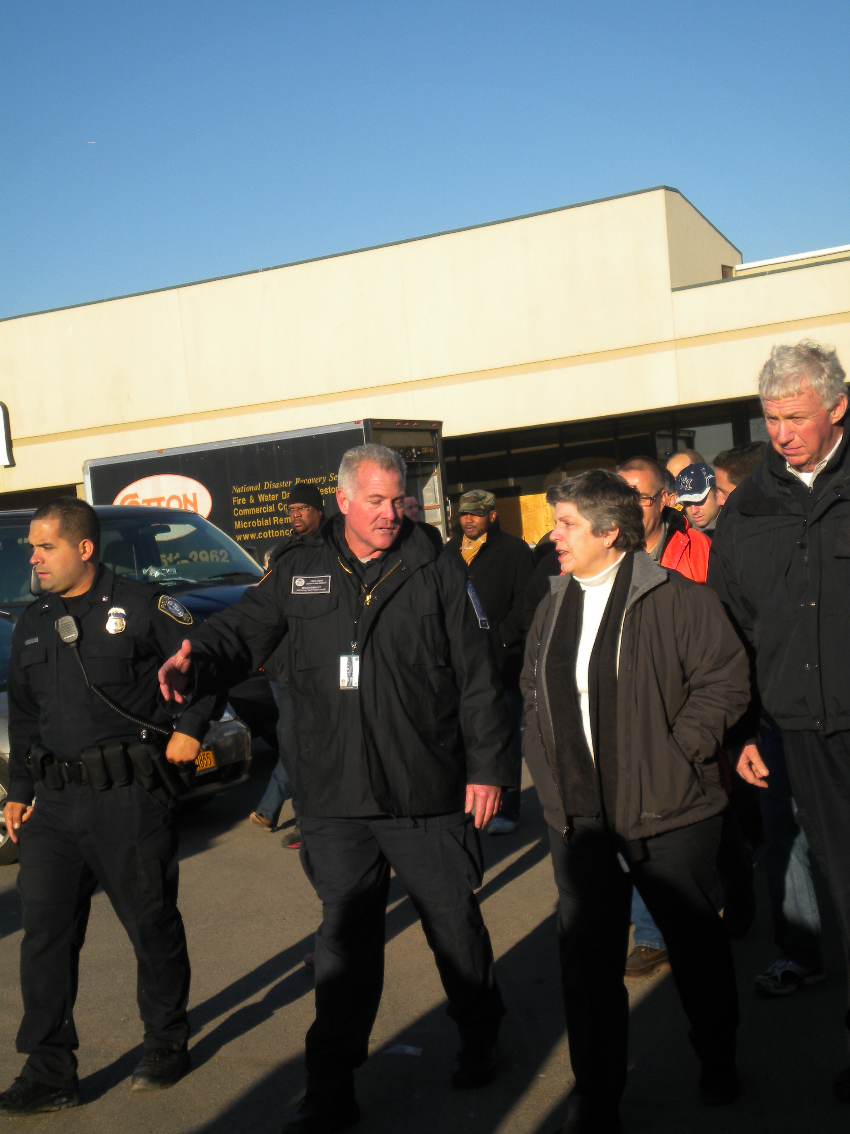 Rockaway, N.Y., Nov. 5, 2012 -- Department of Homeland Security Secretary Janet Napolitano and FEMA Deputy Administrator Richard Serino visited the Rockaways where she met with state, local officials, first responders, and volunteers to discuss ongoing response and recovery efforts of Hurricane Sandy. Photo by Geralda Calixte/FEMA
